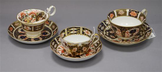 A Royal Worcester scent flask and three Royal Crown Derby Imari duos, H 10cm (flask)